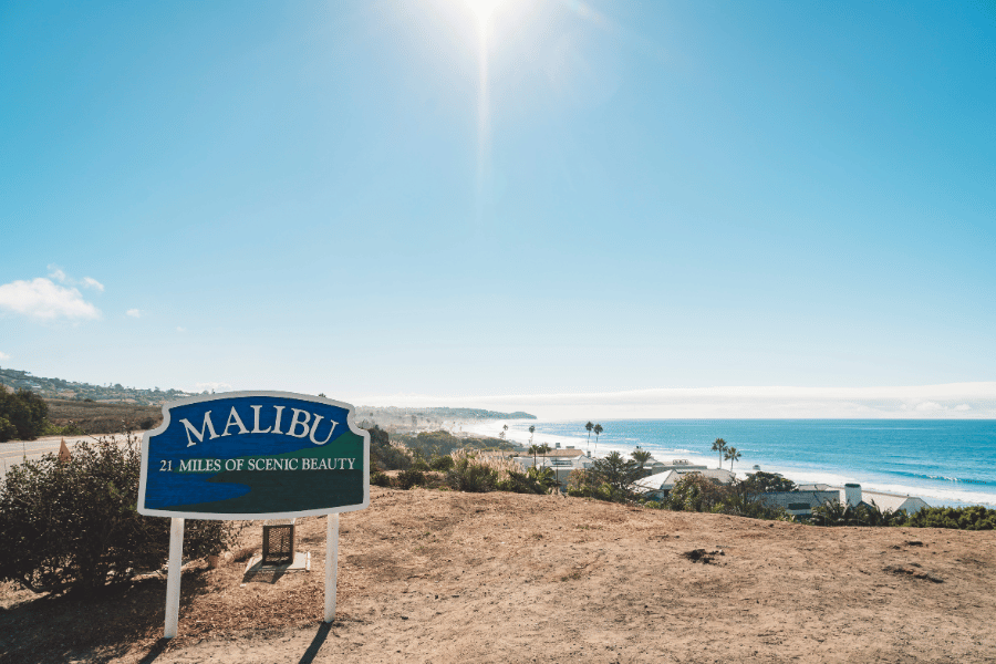 Malibu, CA sign on a scenic drive near the water 