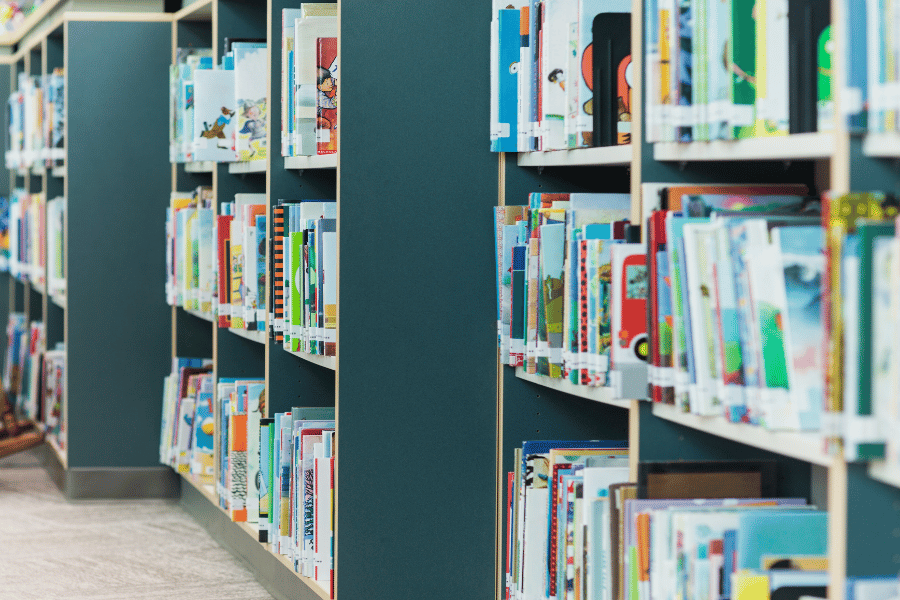 bookshelves full of kids books at the public library