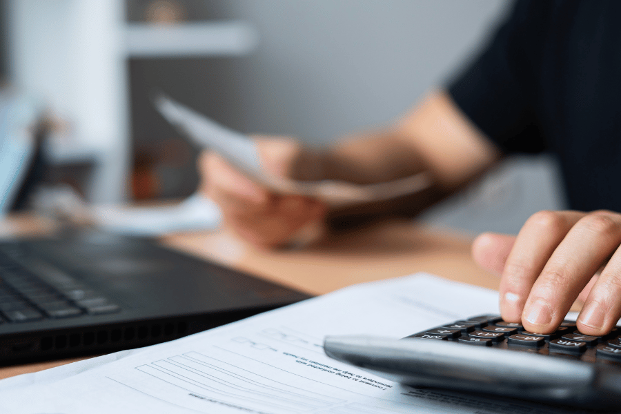 buyer calculating closing costs during the purchasing process