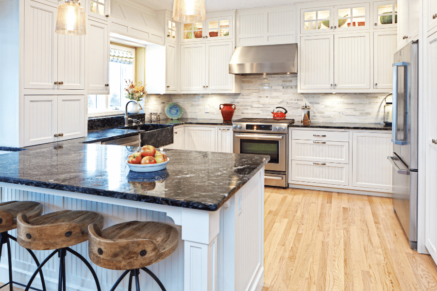 New kitchen remodel with sparkly countertops and cabinets