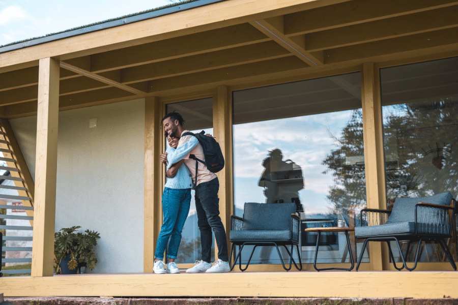 Happy couple at their tiny home