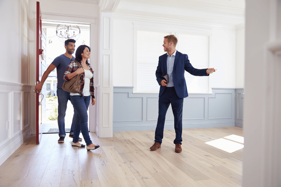 Realtor showing couple a home