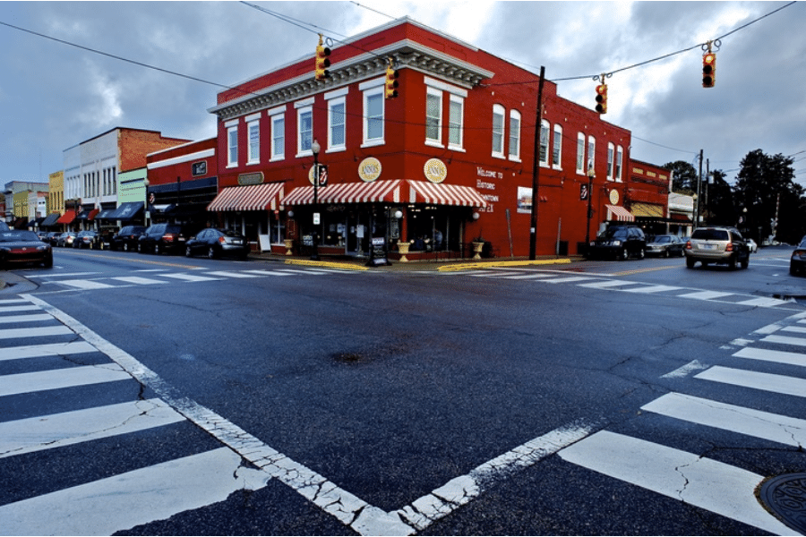 apex downtown brick building at night