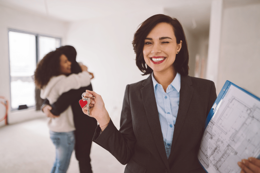 Successful Real Estate Agent Selling a Home to Clients