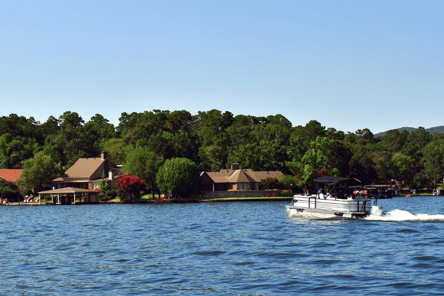 Lake community with boat in the water NC