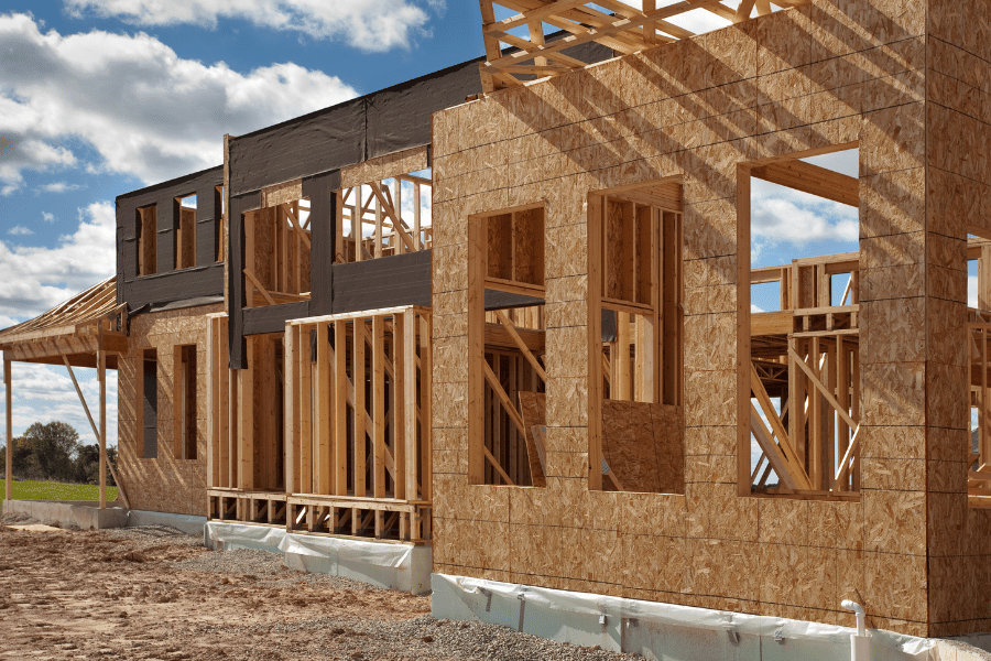 Home being built on the outside with the walls up