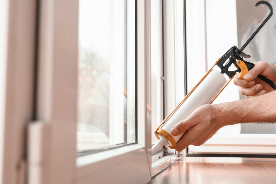 Sealing any cracks in the windows and doors