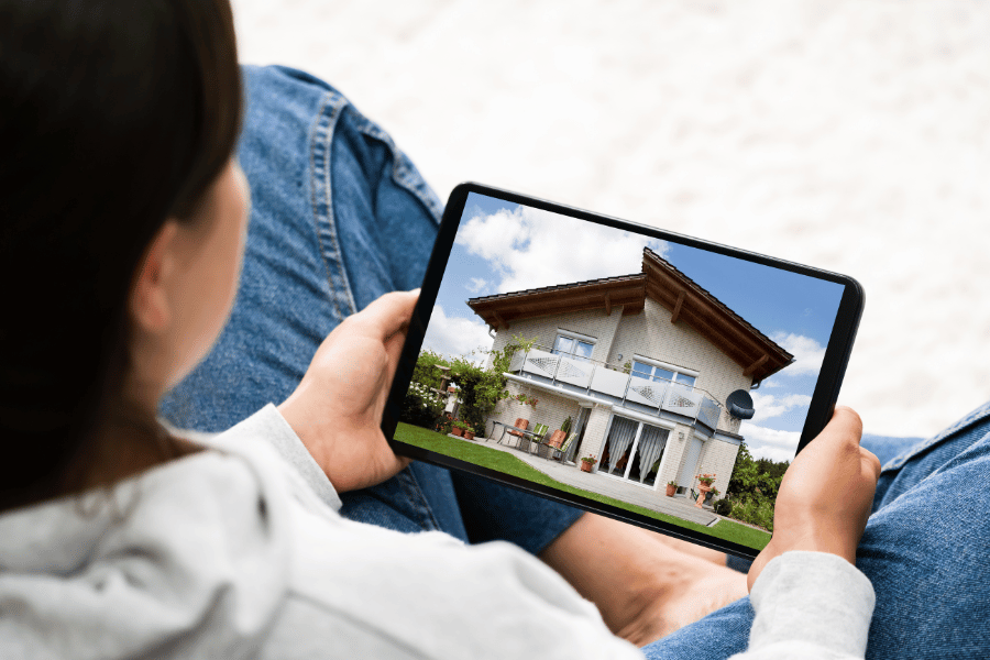 woman looking at a home online