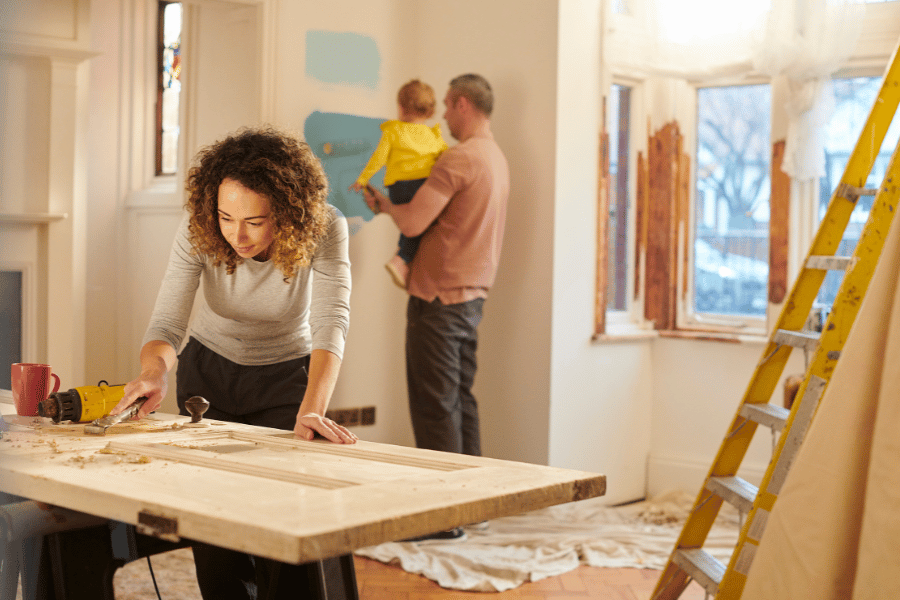 Couple renovating inside of the house