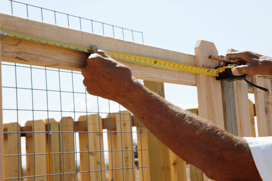 Planning out all the measurements for building a fence