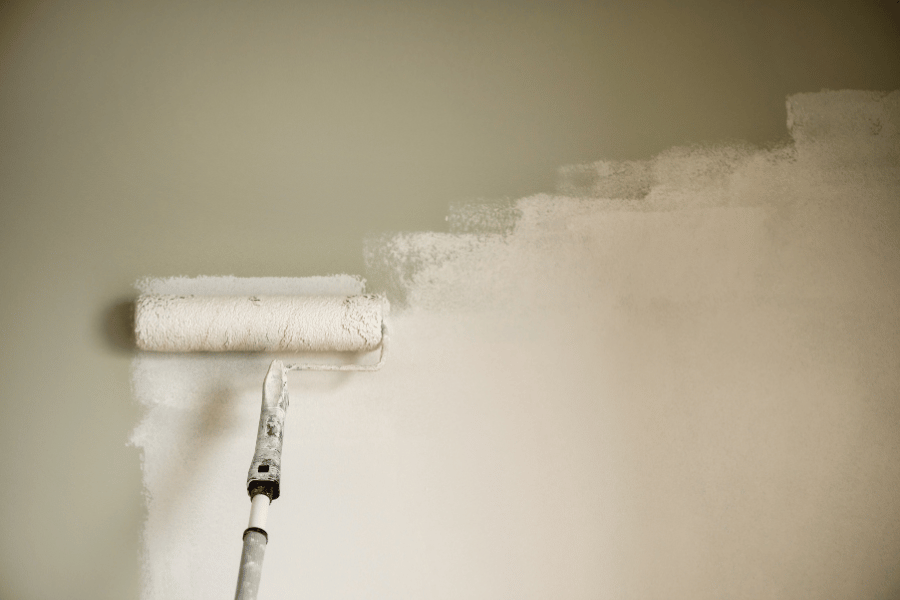 painting green wall a neutral white color to sell the home